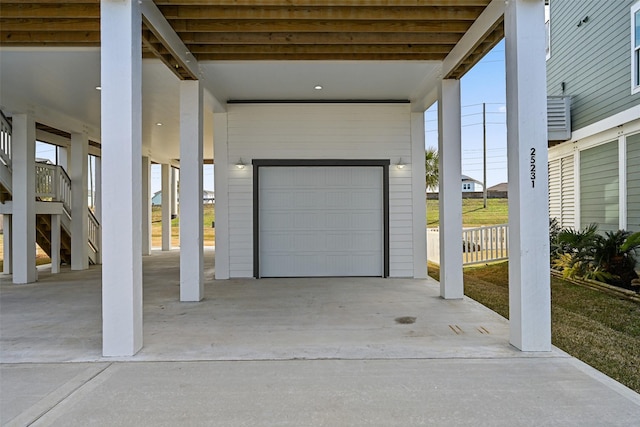 garage with a carport