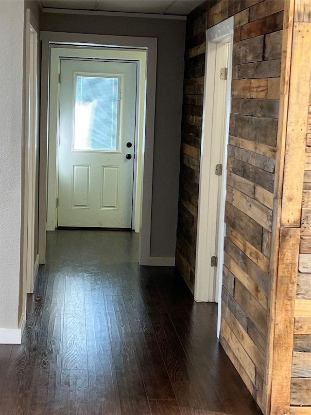 doorway with dark hardwood / wood-style floors