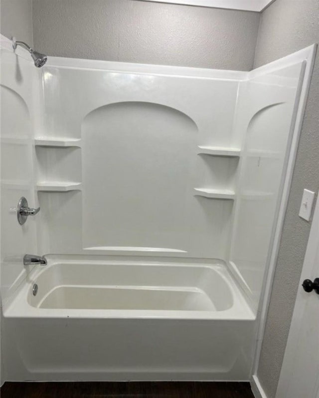 bathroom featuring bathing tub / shower combination