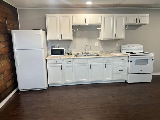 kitchen featuring white cabinetry, sink, white appliances, and dark wood-type flooring