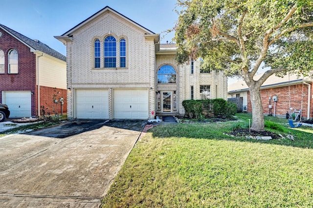 view of front facade featuring a garage and a front yard