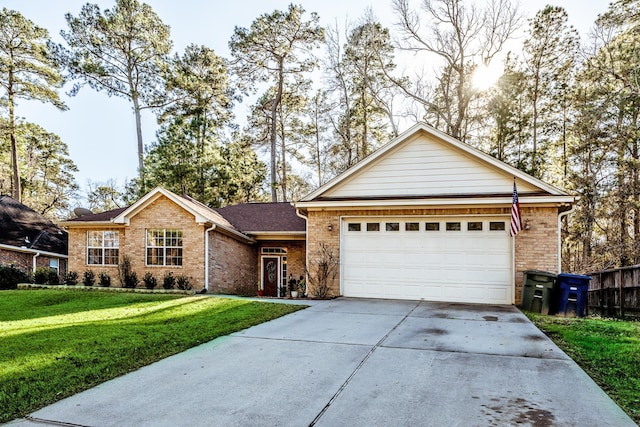 single story home with a garage and a front yard