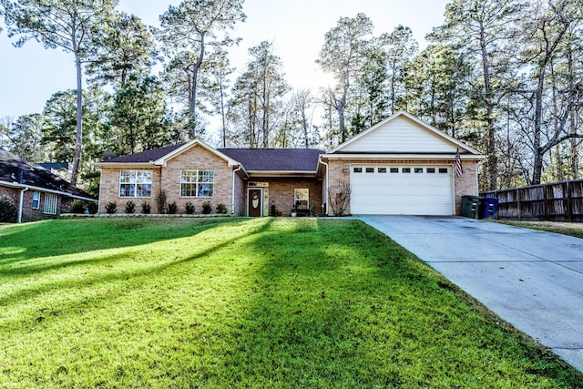 ranch-style house featuring a garage and a front lawn