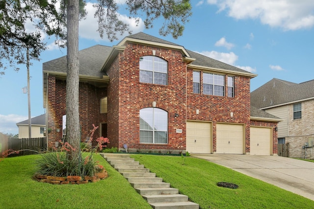 front facade with a garage and a front lawn