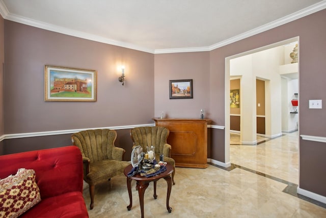 living area with ornamental molding