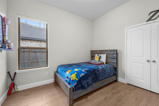 bedroom with light hardwood / wood-style flooring