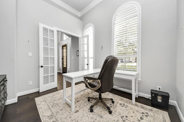 home office featuring dark hardwood / wood-style flooring, crown molding, and french doors