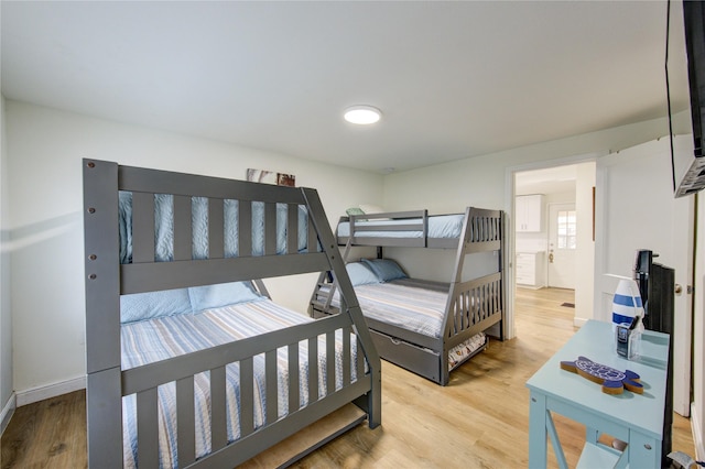 bedroom with light hardwood / wood-style floors