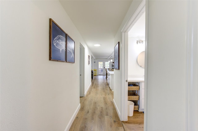 hall featuring light wood-type flooring