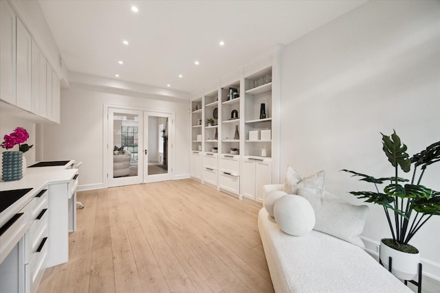 interior space featuring french doors and light hardwood / wood-style flooring