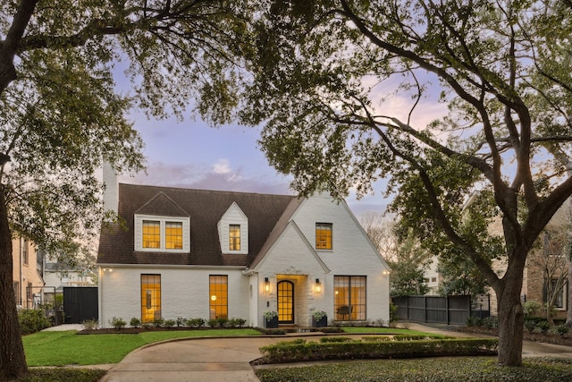 view of front of property with a yard