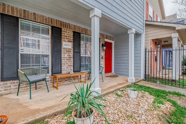 doorway to property featuring covered porch