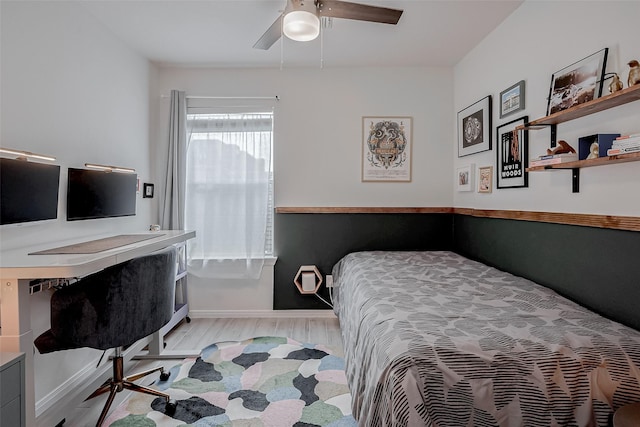 bedroom featuring light hardwood / wood-style flooring and ceiling fan