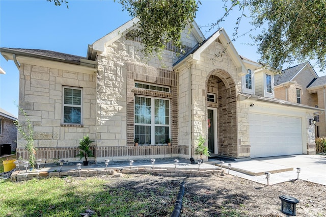 view of front of property featuring a garage