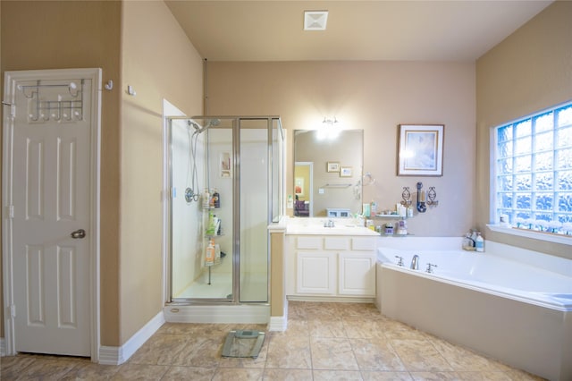 bathroom featuring plus walk in shower and vanity