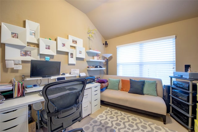 office area featuring vaulted ceiling