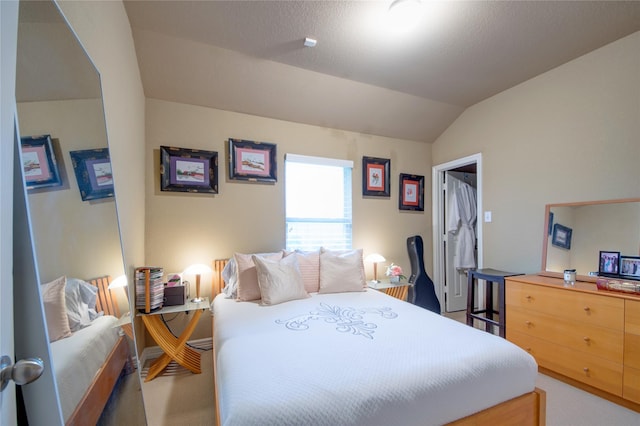 carpeted bedroom featuring vaulted ceiling