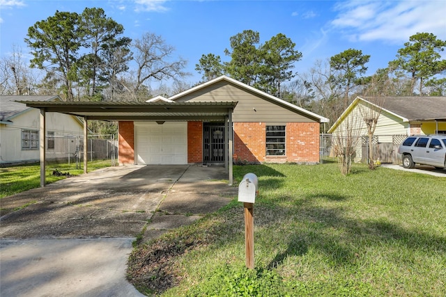 view of front facade with a front yard, fence, a garage, and a carport