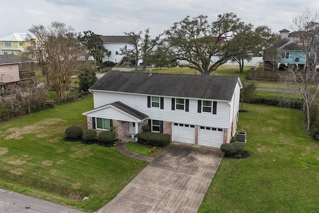 view of front of home featuring a garage, central AC unit, and a front yard