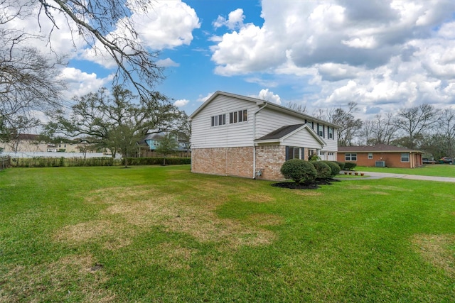 view of home's exterior featuring a lawn