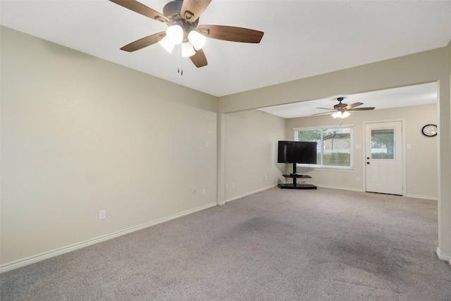 unfurnished living room with light colored carpet