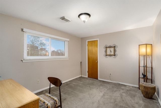 sitting room with light carpet