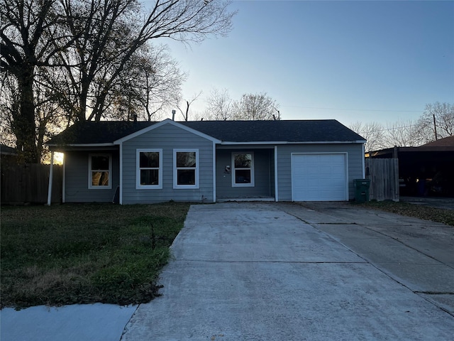 single story home with a garage