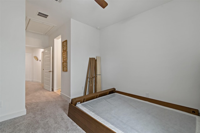 unfurnished bedroom with light colored carpet and ceiling fan