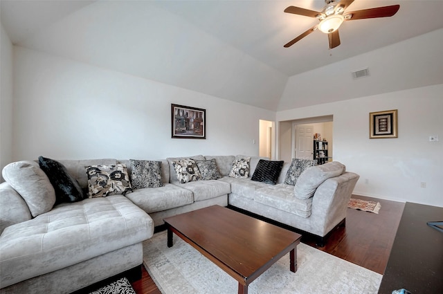 living room with lofted ceiling, wood-type flooring, and ceiling fan