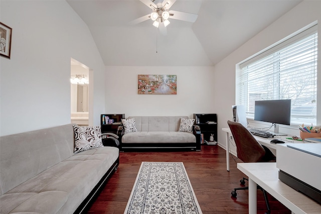 home office with ceiling fan, lofted ceiling, and dark hardwood / wood-style flooring