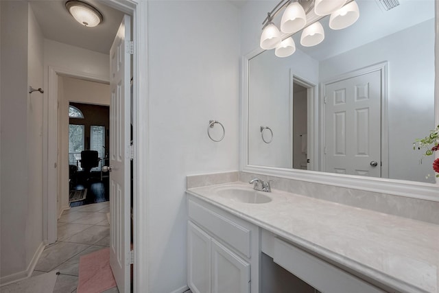 bathroom with vanity and tile patterned floors