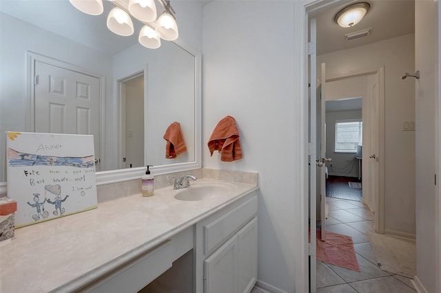 bathroom with vanity and tile patterned floors