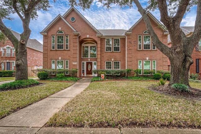 view of front of property with a front lawn