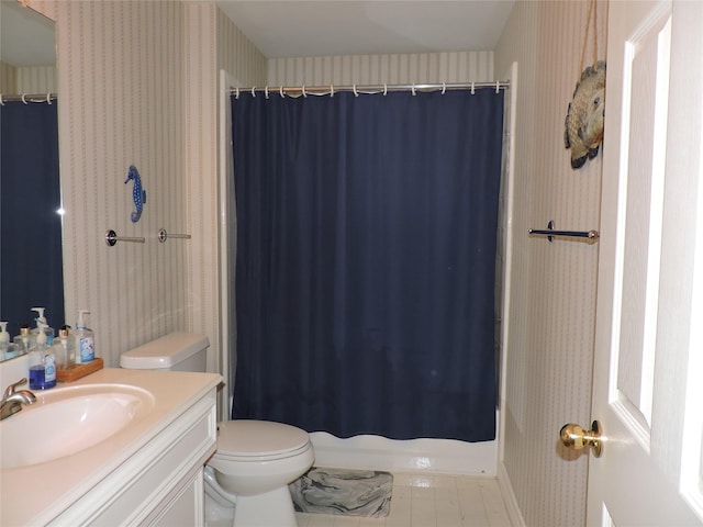 full bathroom featuring vanity, toilet, and shower / bathtub combination with curtain