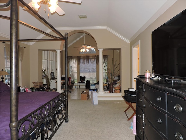 bedroom with decorative columns, vaulted ceiling, ornamental molding, and carpet flooring