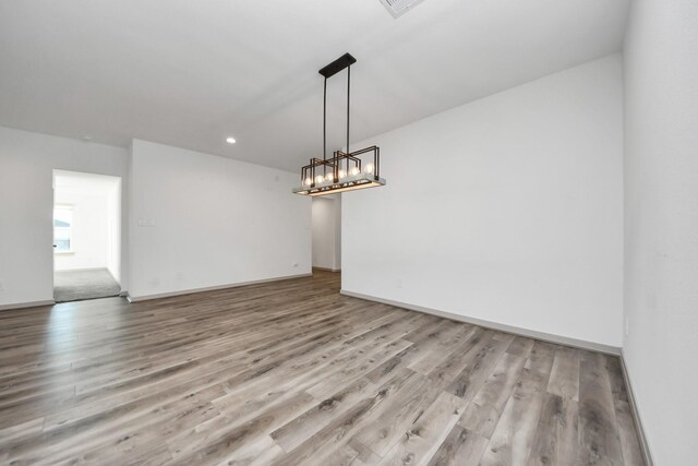 unfurnished dining area with light hardwood / wood-style flooring