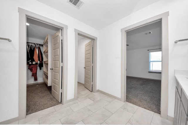 bathroom featuring vanity and tile patterned flooring