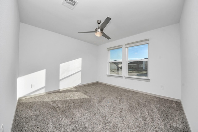 carpeted empty room with ceiling fan