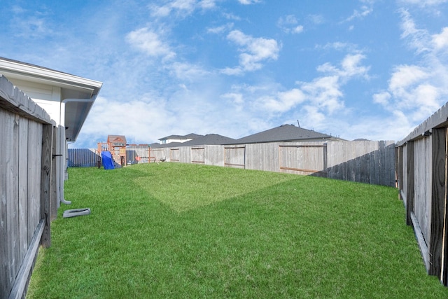 view of yard with a playground