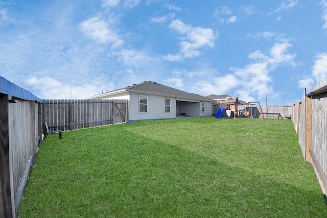 view of yard with a playground