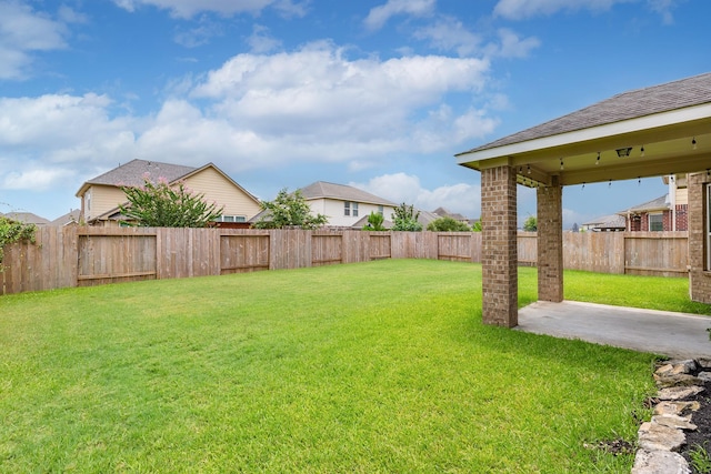 view of yard with a patio area