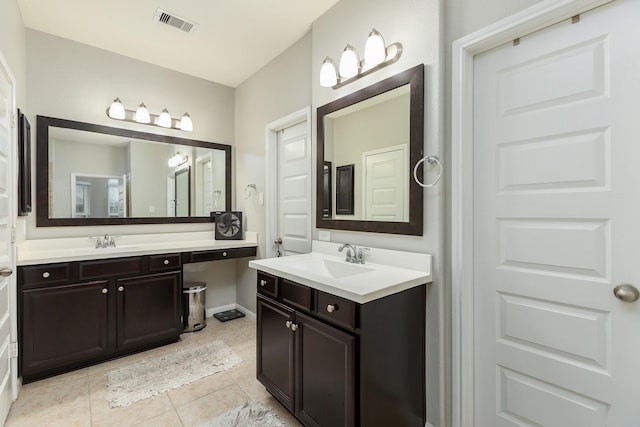 bathroom featuring vanity and tile patterned flooring