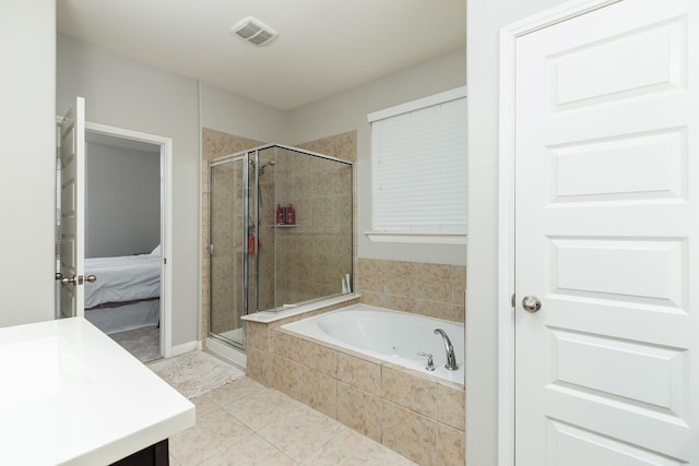 bathroom with vanity, tile patterned floors, and shower with separate bathtub