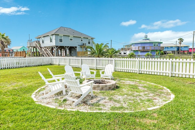 view of yard featuring a fire pit