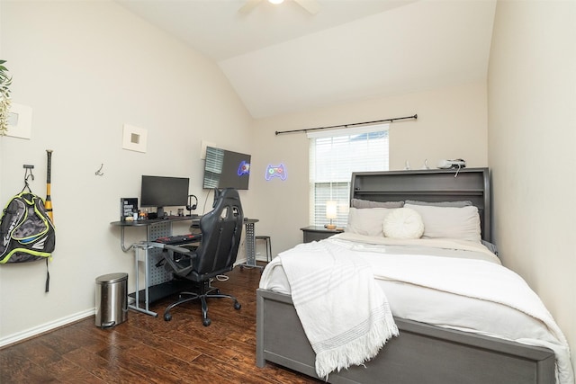 bedroom featuring lofted ceiling and dark hardwood / wood-style floors