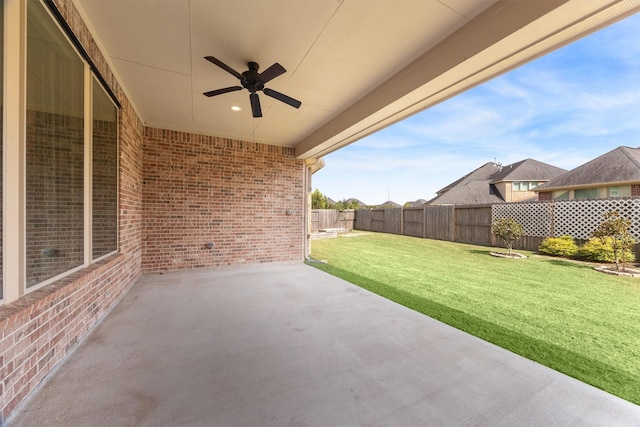 view of patio featuring ceiling fan