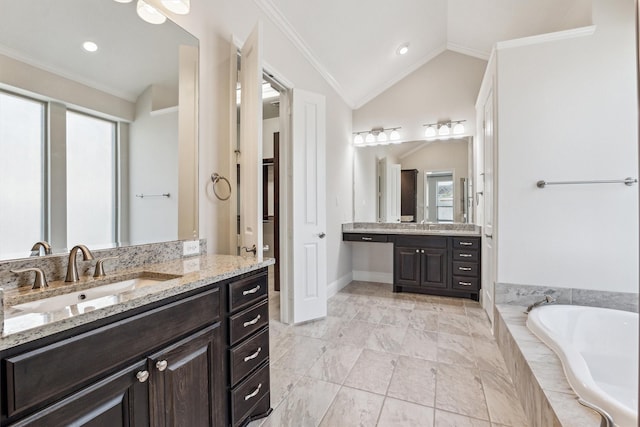 bathroom with a relaxing tiled tub, vanity, crown molding, and vaulted ceiling