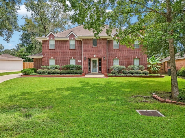 view of front of property featuring a front lawn