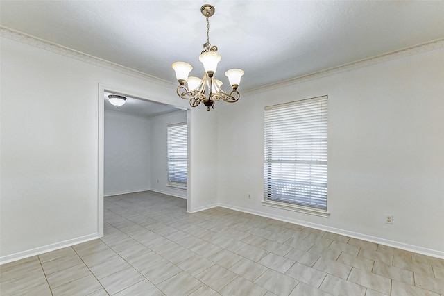 unfurnished room featuring a notable chandelier and crown molding