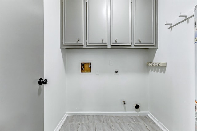 laundry area featuring cabinets, hookup for an electric dryer, and hookup for a washing machine